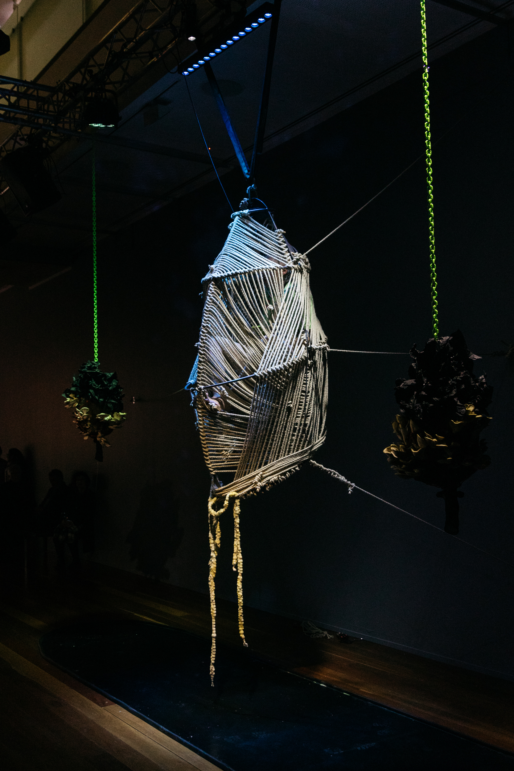 Exosmosis — rope pod suspended with green chains, Samstag Museum of Art, 2022